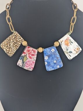 Signed Plunder Metal Print Plate Necklace On Green Leather Cord
